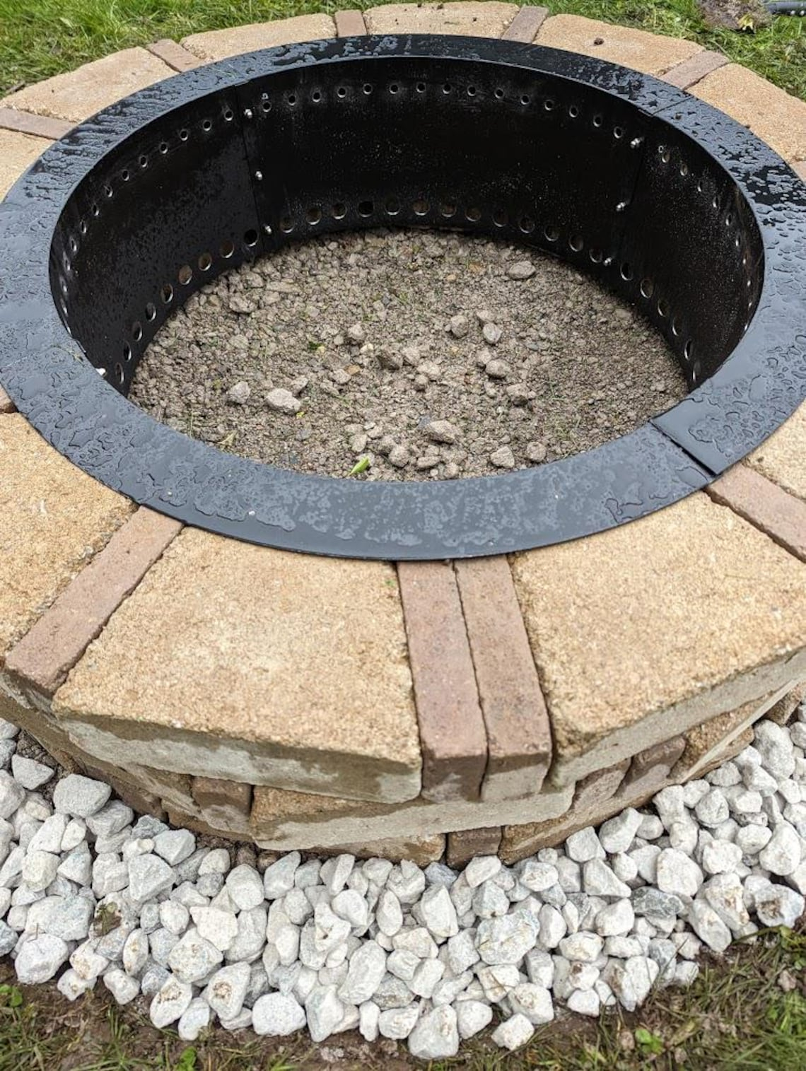 Why your backyard fire pit smokes and how proper ring placement fixes it