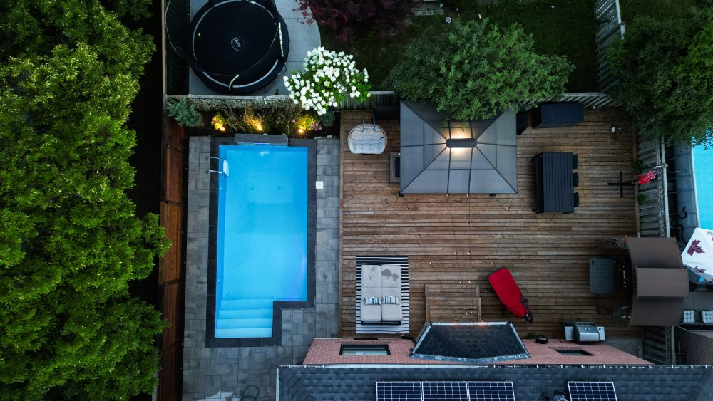 Transform Your Backyard With A Custom Pool Design: Tips For Creating A ... pertaining to Transforming Your Backyard Into a Resort Retreat With Strategic Umbrella Placement