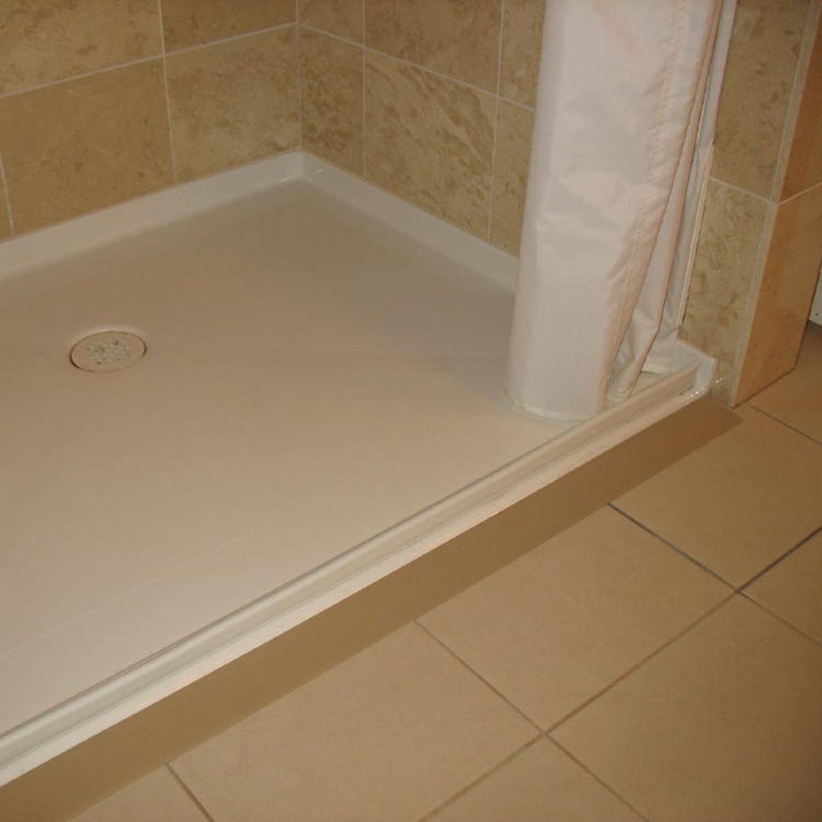 Understanding Water Containment Systems in Modern Walk-In Showers