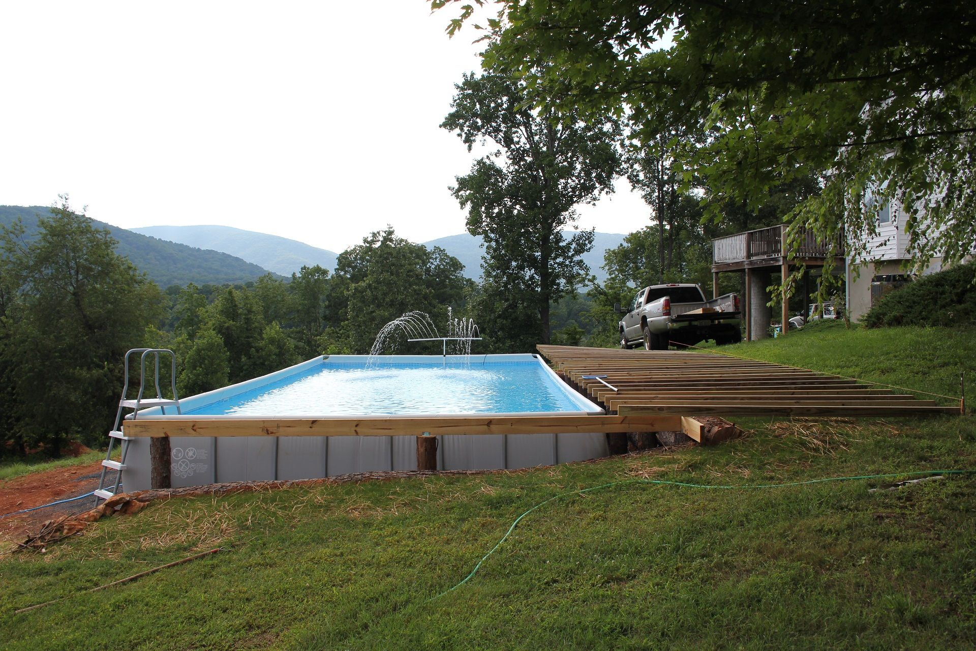 Steep Slope Swimming Pool Polyergo&amp;#039;s Summer House Sits On A Steep with Infinity Pool Design