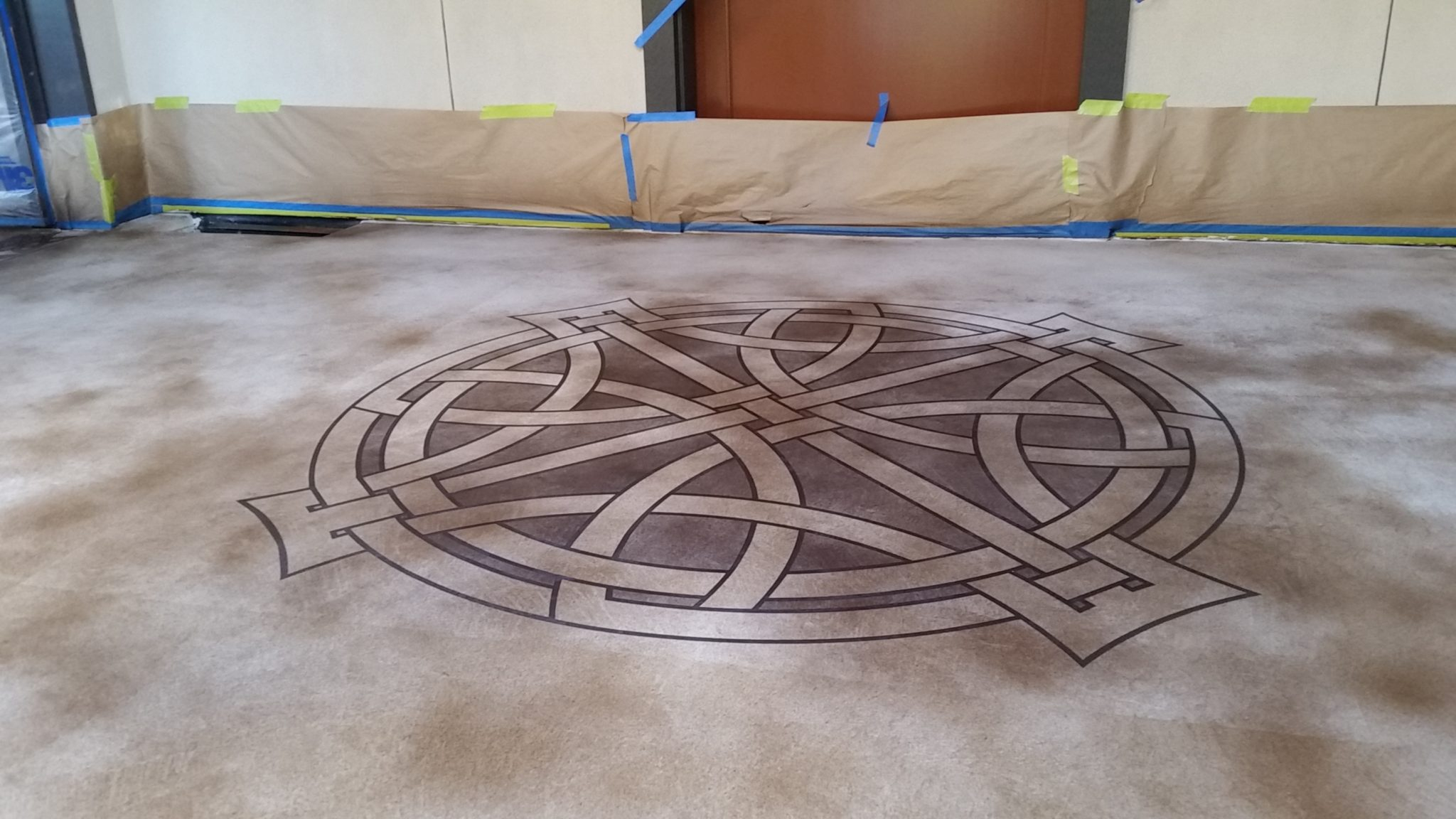 Transforming Plain Concrete and Wood Surfaces Through Creative Floor Stenciling Techniques