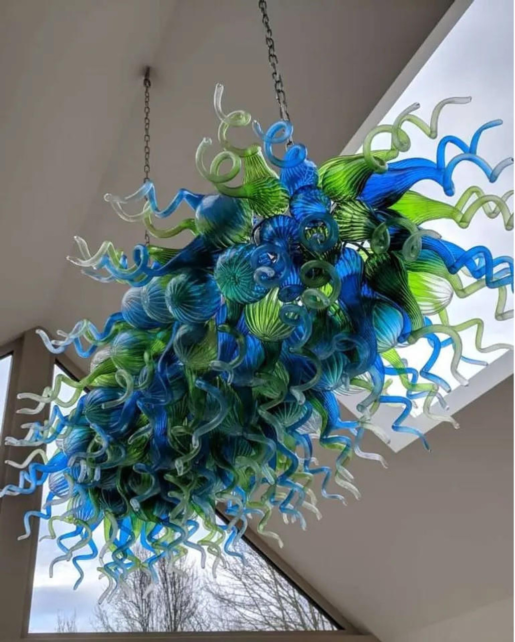The Art Of Light: Exploring The History And Craftsmanship Behind ... intended for Exploring the Craftsmanship Behind Contemporary Resin Chandeliers and Sculptural Sconces