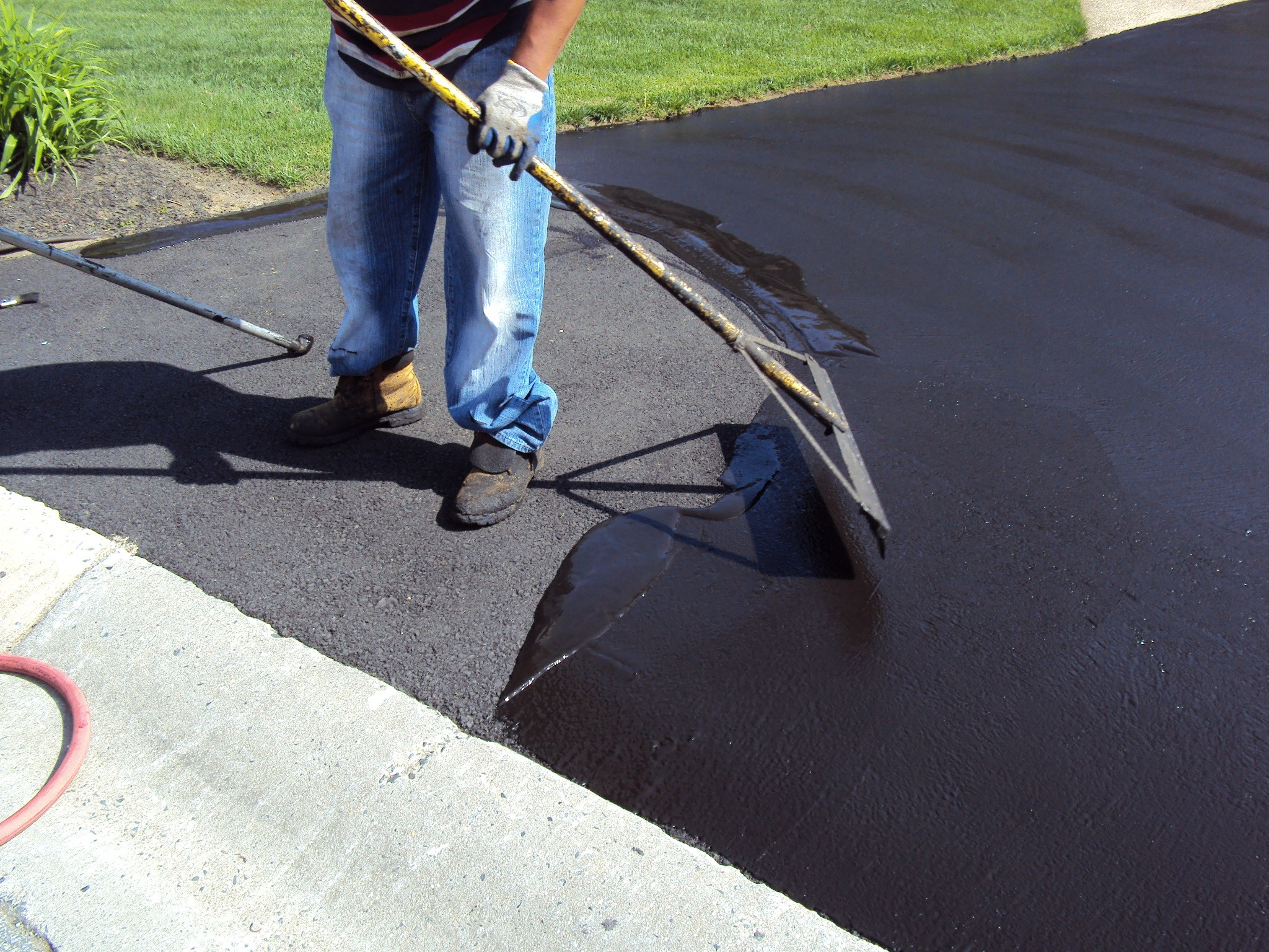 Why Is Seal Coating Necessary - Commonwealth Paving with Asphalt Driveway